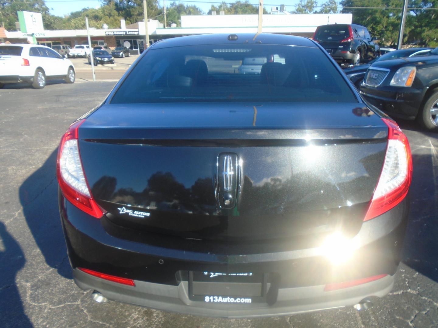 2014 Lincoln MKS (1LNHL9DK3EG) , located at 6112 N Florida Avenue, Tampa, FL, 33604, (888) 521-5131, 27.954929, -82.459534 - Photo#4